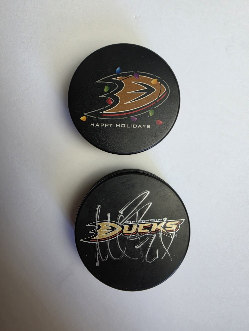 Anaheim Ducks NHL Officially Licensed Hockey Pucks ~ Set of 2
